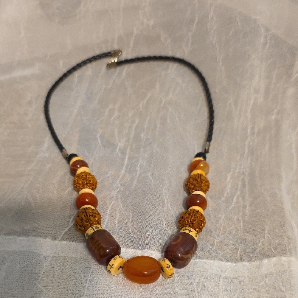 Elegant Beaded Necklace with Brown and Tan Accents